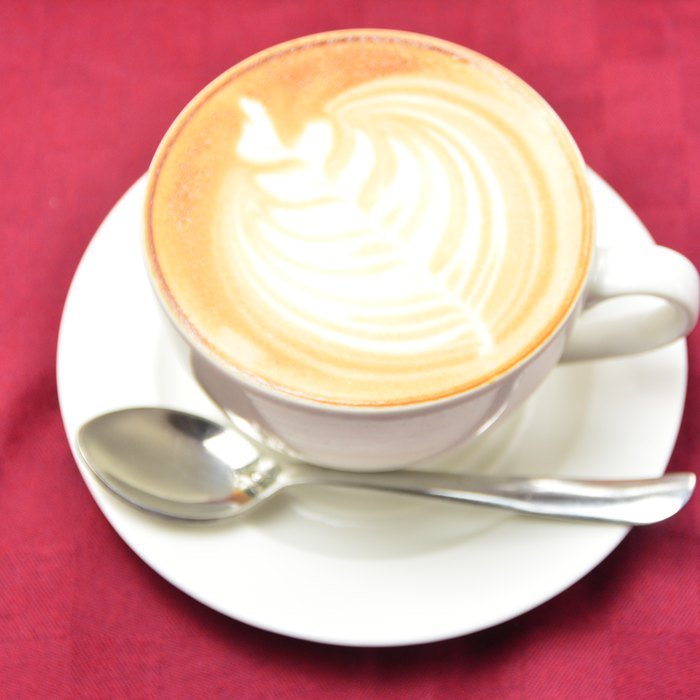 Cappuccino with latte art at the City Star coffee lounge