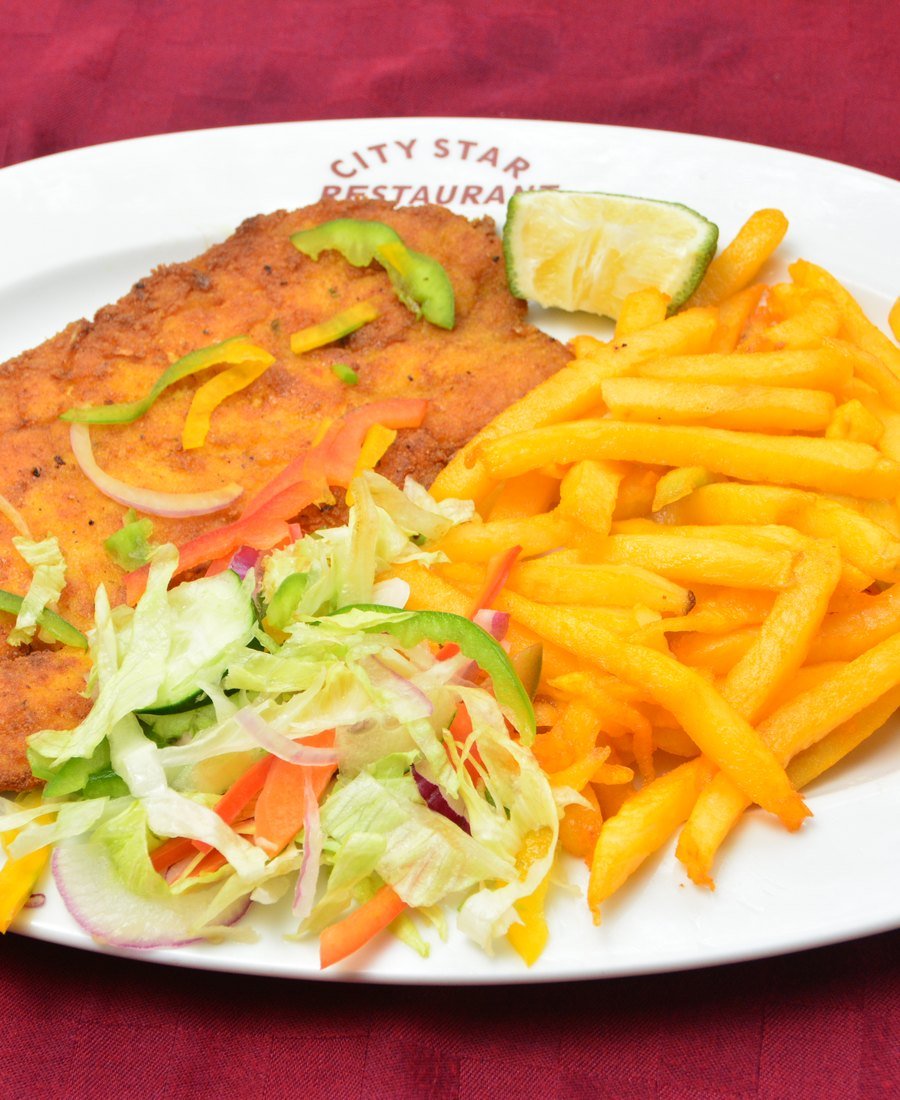 Crispy fillet with chips and salad at City Star